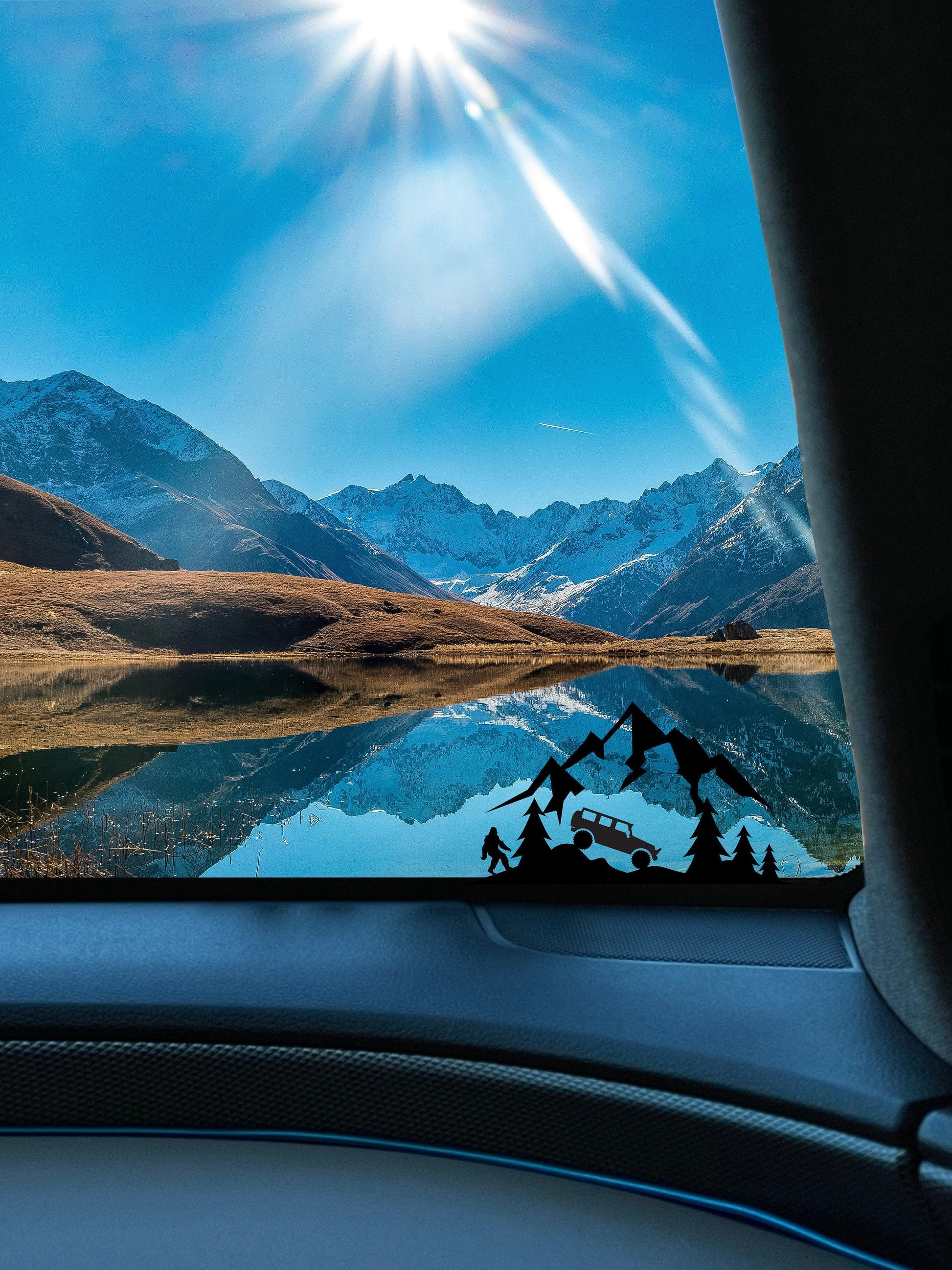 Jeep in Mountains with Bigfoot in the Woods Windshield Decal